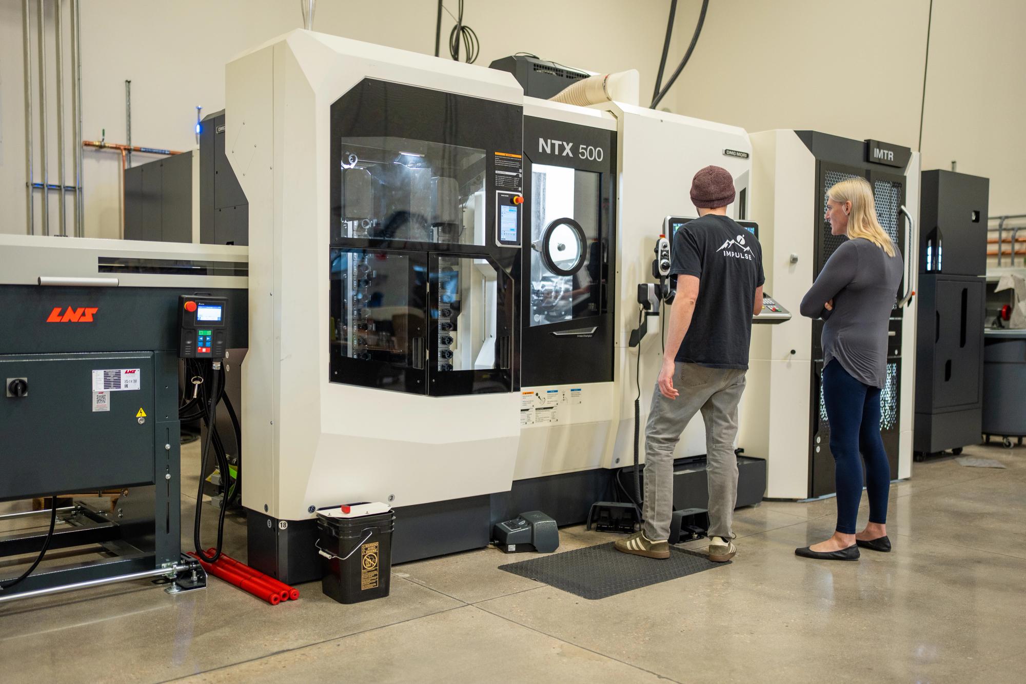 Machining equipment at Impulse Space’s Colorado facility, shown in its March 2026 announcement. Source: Impulse Space.
